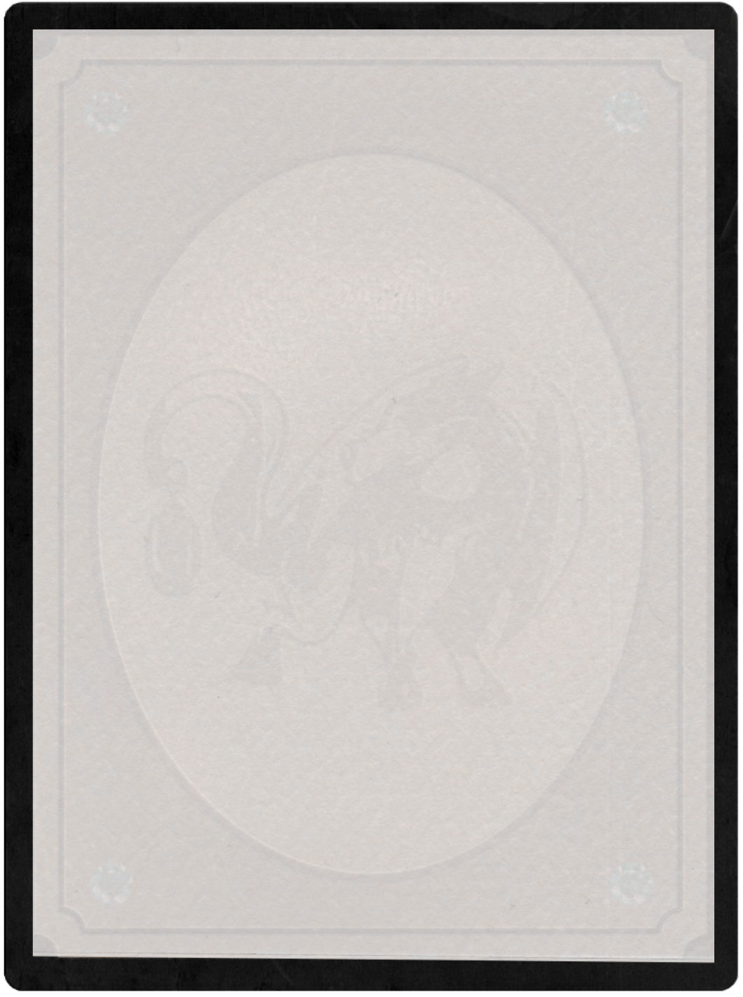 Card stock with a big dragon on it in white.
